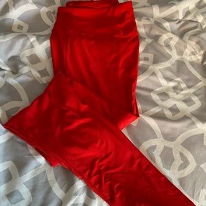 Red leggings/ tights